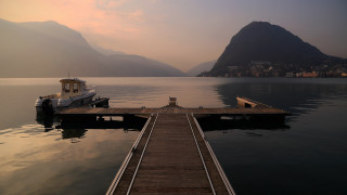 Lake mountains boat pier sunset - anamorphic len free wallpaper for desktop