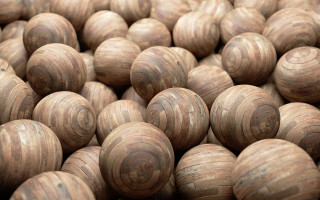 Wooden balls pyramid kinetic art - a large group free wallpaper
