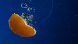 Orange floating bubbles blue background - bubble free wallpaper for desktop