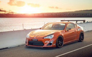 Car road ocean sunset beach - the sun setting free wallpaper