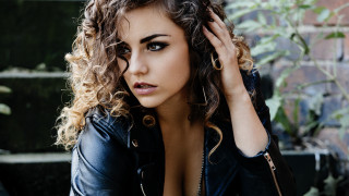 Curly hair black jacket portrait - curly hair free wallpaper
