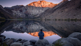 Mountain lake reflection rock outdoors - a mountain range in the background free wallpaper