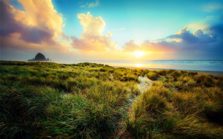 Grassy field path ocean sunset - a path free wallpaper