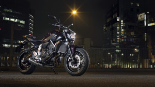 Motorcycle city night streetlight buildings - a city free wallpaper
