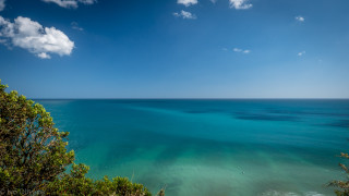 Ocean hilltop view blue sky - a hill top free wallpaper