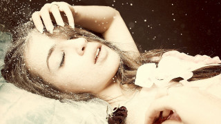 Woman blowing wind snow night - her eye free wallpaper for desktop