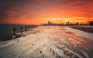 Snowy beach city sunset mountain - a red sky free wallpaper