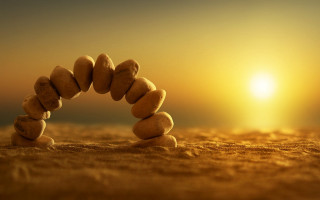 Stone arch desert sunset land - the sun setting behind free wallpaper