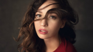 Woman redshirt wavyhair portrait browneyes - her eye wide open free wallpaper