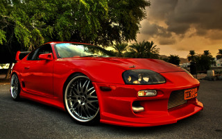 Red sports car cloudy sky 8 - the side of the road free wallpaper for desktop