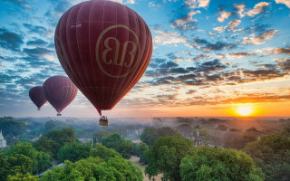 Hot air balloons sunset forest - over a forest free wallpaper for desktop