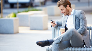 Man sitting coffee cellphone blurry - his cell phone free wallpaper for desktop