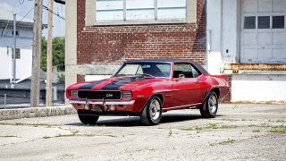 Red car tiltshift vroom fence - the side of a road next free wallpaper