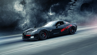 Black sports car spacecraft smoke - a street in front free wallpaper