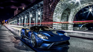 Blue sports car night cityscape - the side of a road free wallpaper for desktop