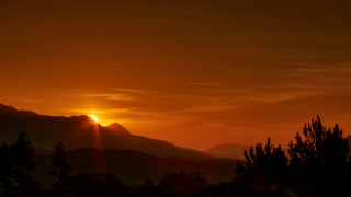 Sunset mountains trees clouds orange - a sunset free wallpaper for desktop