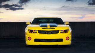 Yellow sports car sunset cloudy - a black car free wallpaper