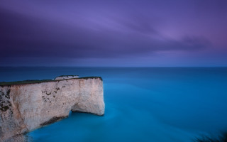 Long exposure cliff ocean purple - a purple sky above free wallpaper for desktop