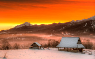Snowy landscape barn mountains sunset - a red sky free wallpaper
