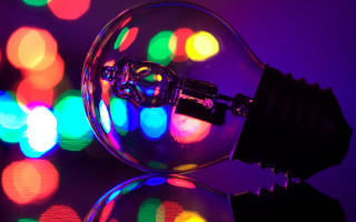 Lightbulb colorful lights reflection macro - a light bulb free wallpaper for desktop