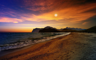 Beach sunset mountain city lights - over the water free wallpaper for desktop