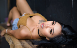 Tattooed woman lying on wooden - tattoo free wallpaper for desktop