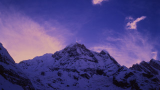 Snowy mountain purple sky city - a mountain free wallpaper for desktop