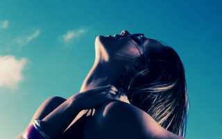 Woman bikini blowing hair outdoors - evert collier free wallpaper