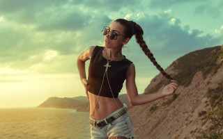 Woman braid cliff ocean sunset - a braid free wallpaper