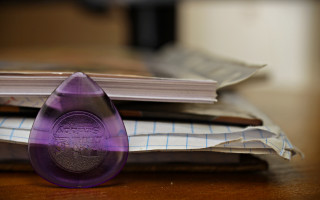 Purple object wooden table papers - a purple object free wallpaper