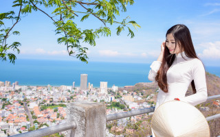 Woman white dress balcony cityscape - a balcony free wallpaper