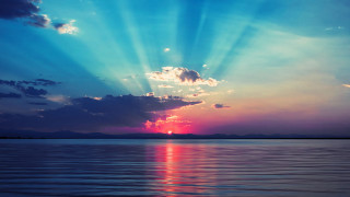 Sunset lake crepuscular rays beach - cloud and sun beams free wallpaper