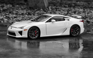 White sports car wet surface - a wet surface free wallpaper