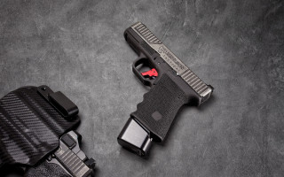 Gun holster gray background red - a black belt free wallpaper