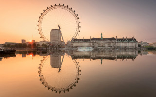 Ferris wheel water sunset city - perfect symmetry free wallpaper