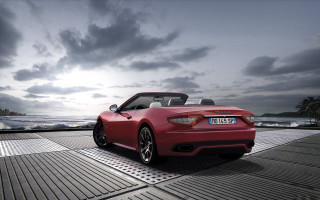 Red sports car ocean deck - f 8 aperture free wallpaper