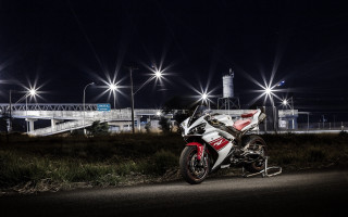 Motorcycle night bridge lights puzzle - the side of a road free wallpaper