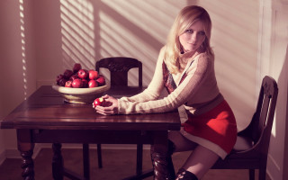 Woman sitting table apple bowl - emma geary free wallpaper