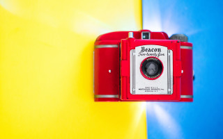 Red camera yellow blue wall - background behind free wallpaper