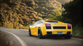 Yellow sports car mountains california - rim free wallpaper