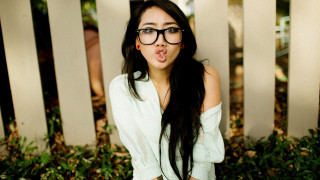 Funny face woman glasses outdoors - a funny face free wallpaper