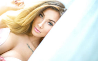 Woman tattoo bed blonde blue - her arm behind her back free wallpaper