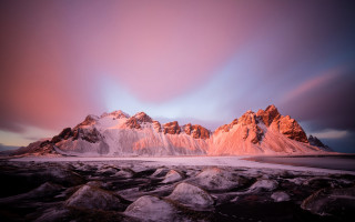 Mountain range pink sky rocks - a few cloud free wallpaper for desktop