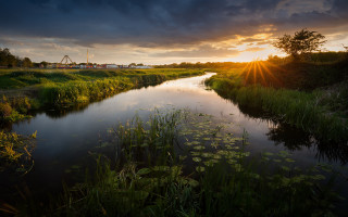 River bridge sunset clouds green - free summer wallpaper