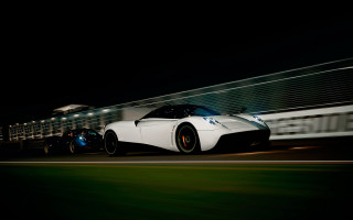 White sports car night train - a person in the background free wallpaper