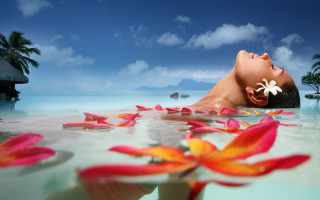 Woman floating flowers water blue - closed free wallpaper for desktop