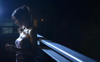 Woman balcony cellphone dark bright - a balcony free wallpaper for desktop