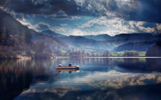 Lake mountains clouds boat person - photography free wallpaper