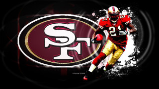 Football player running helmet san - a football player running free wallpaper for desktop