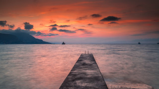 Long dock ocean sunset mountain - a long dock free wallpaper